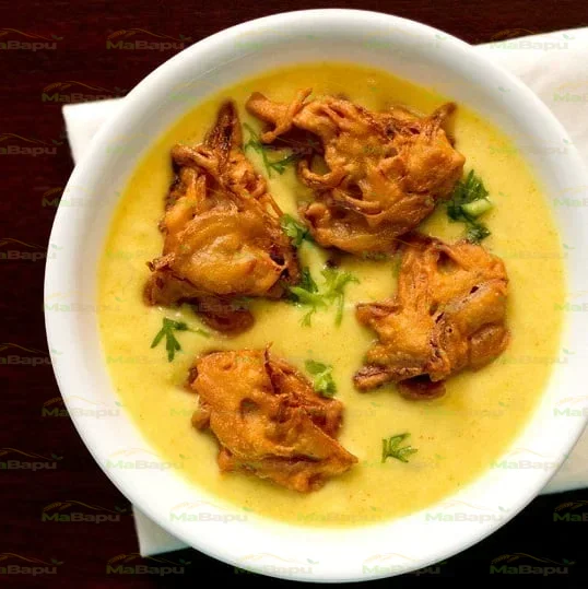 Authentic Punjabi Kadhi Pakora Recipe (Kadhi with Onion Fritters)